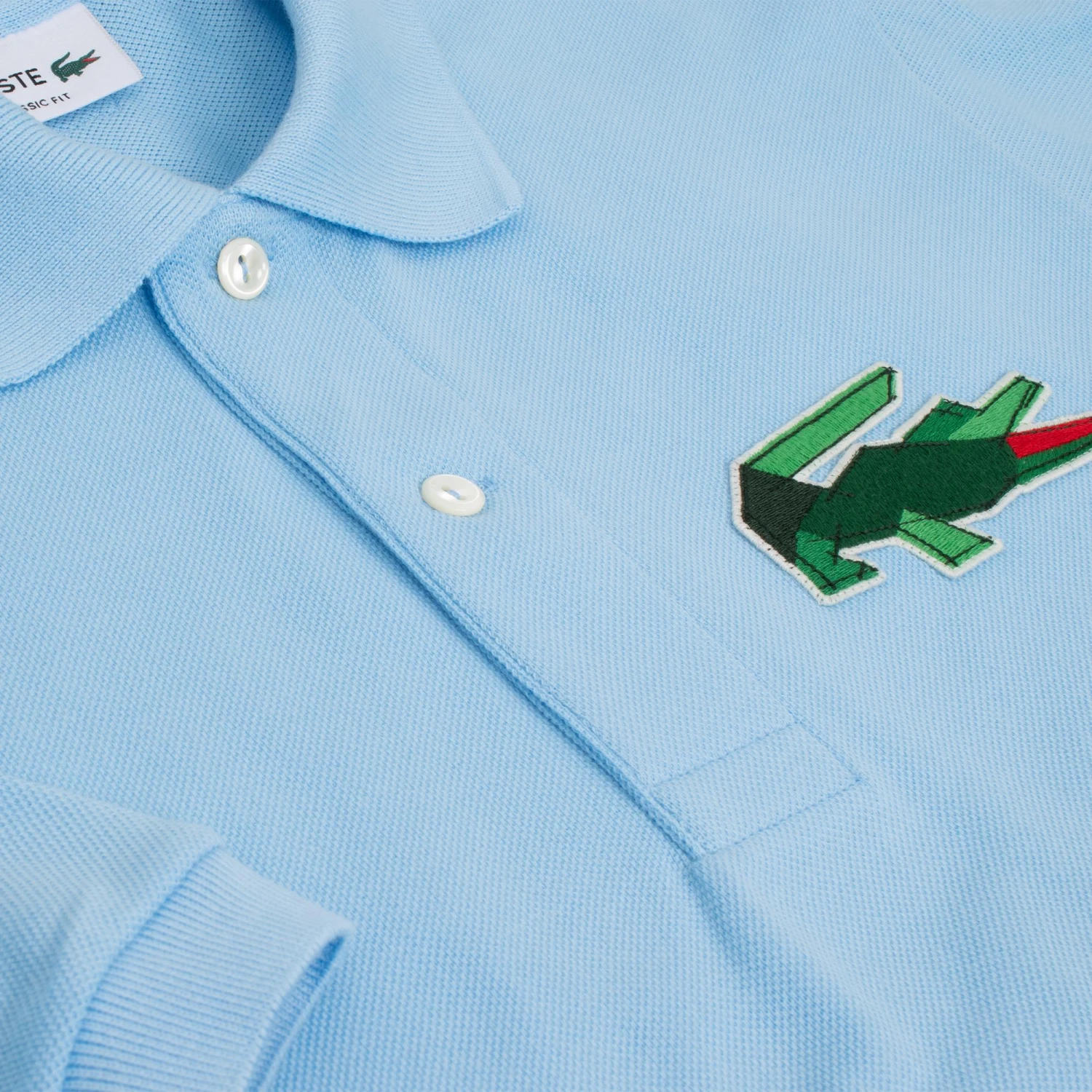 Lacoste Classic Fit L1212 Graphic Badge Polo Shirt Pale Blue 5 Lacoste Classic Fit L1212 Graphic Badge Polo Shirt Pale Blue - Image 3